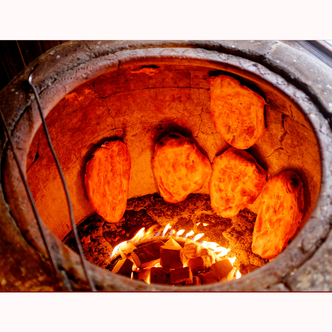 Open-fire hearth cooking